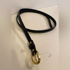 Woman’s 1/2” black croc embossed belt with brass buckle, Size: M